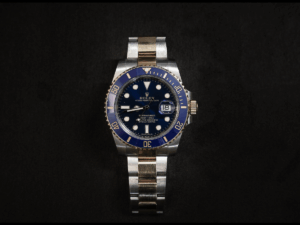 Image of a Rolex against a black background